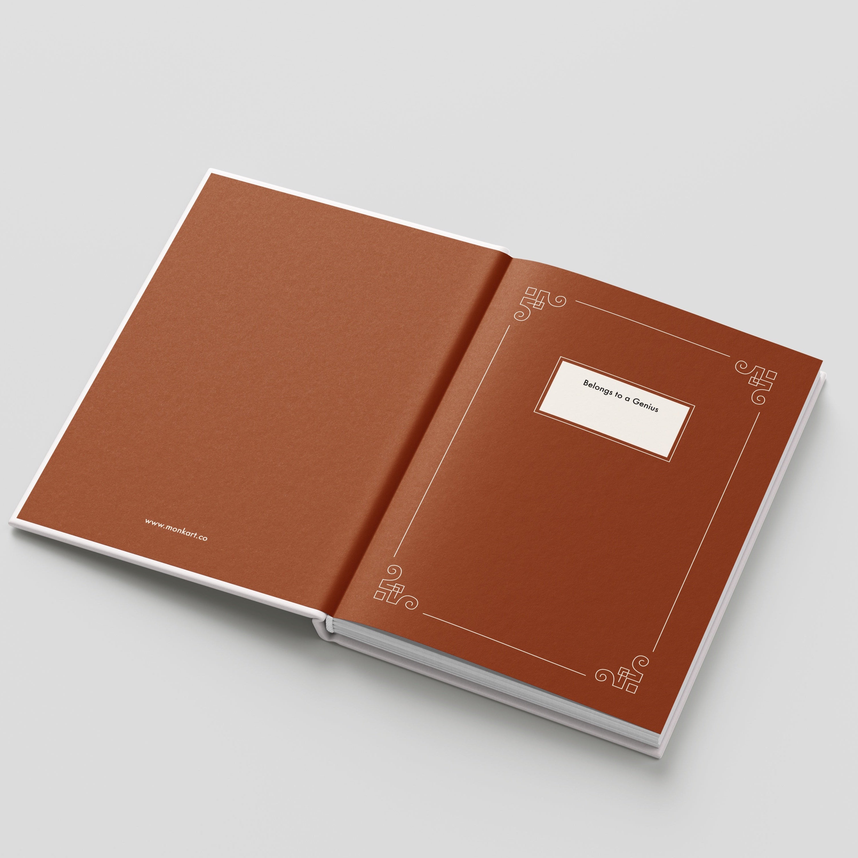 Open brown book with decorative elements on a light gray background