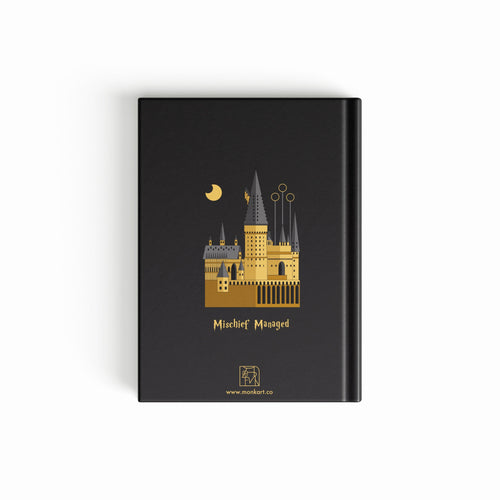 Black notebook back with gold and white design of Hogwarts School of Witchcraft and wizardry on a black background