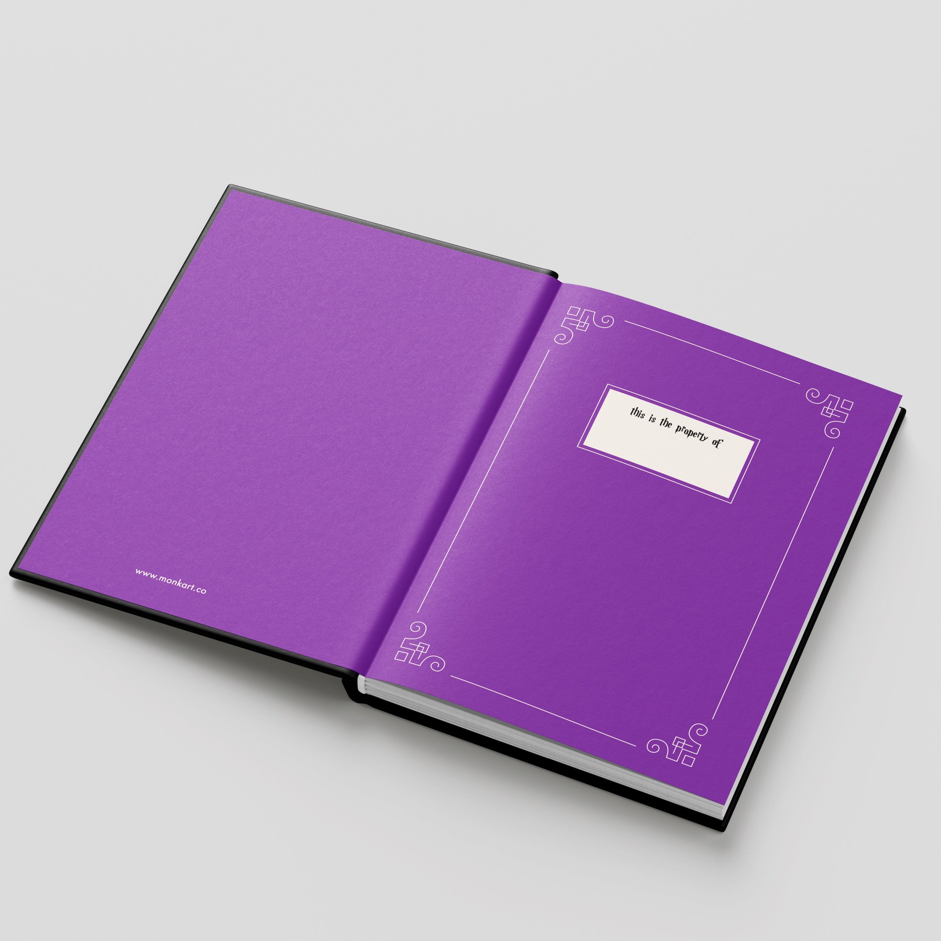 Open purple book on a light gray background