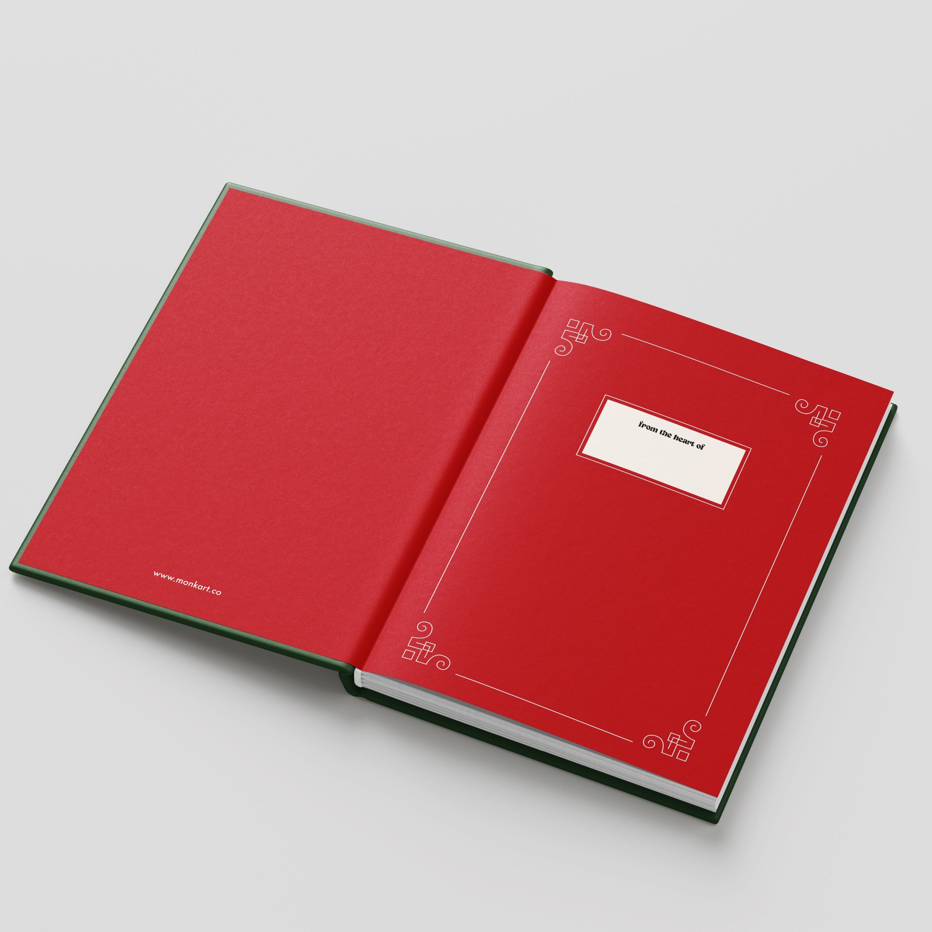Open red book with decorative edges on a light gray background