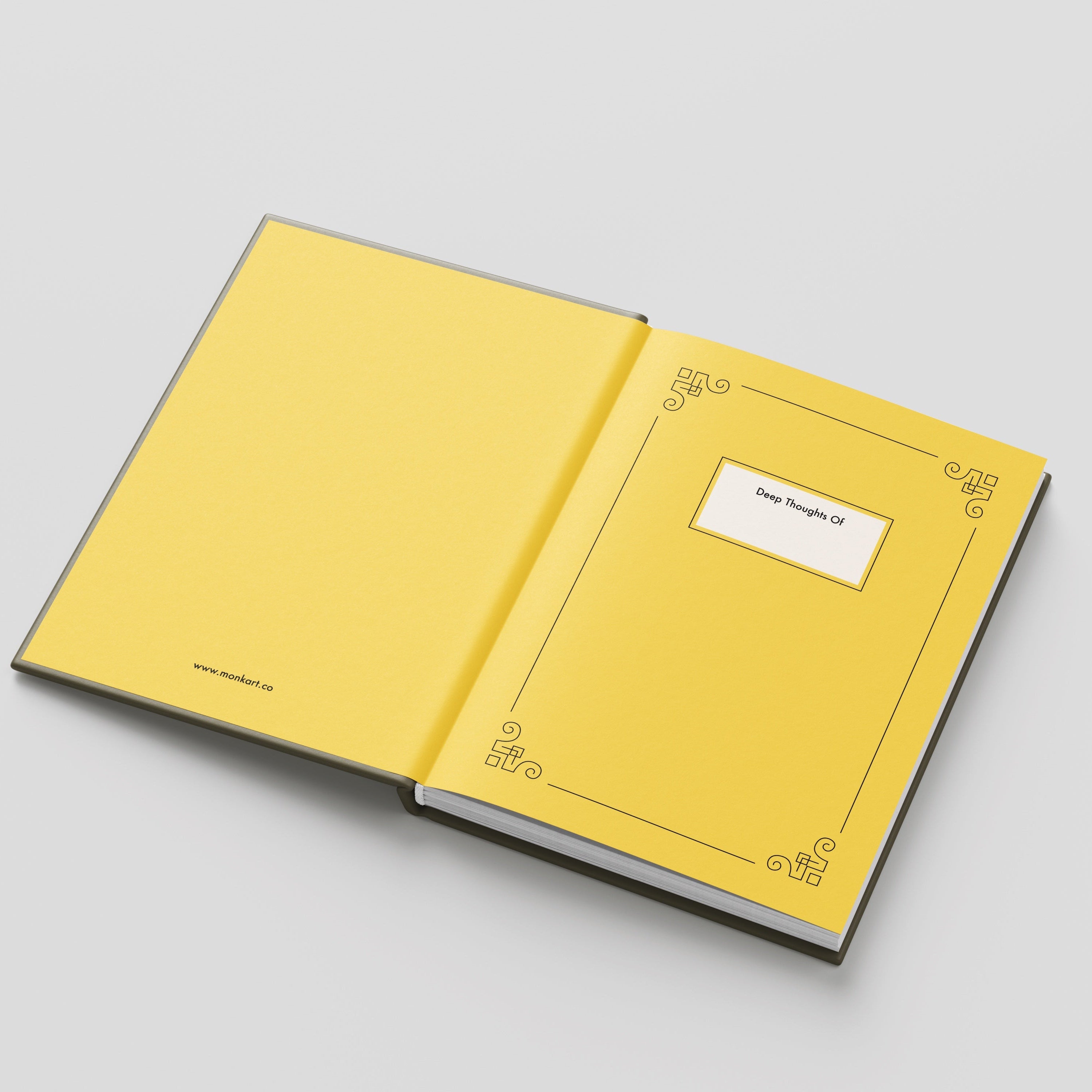 Open yellow notebook on a light gray background