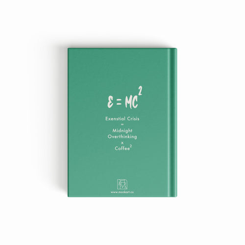 Green notebook with white text on a white background