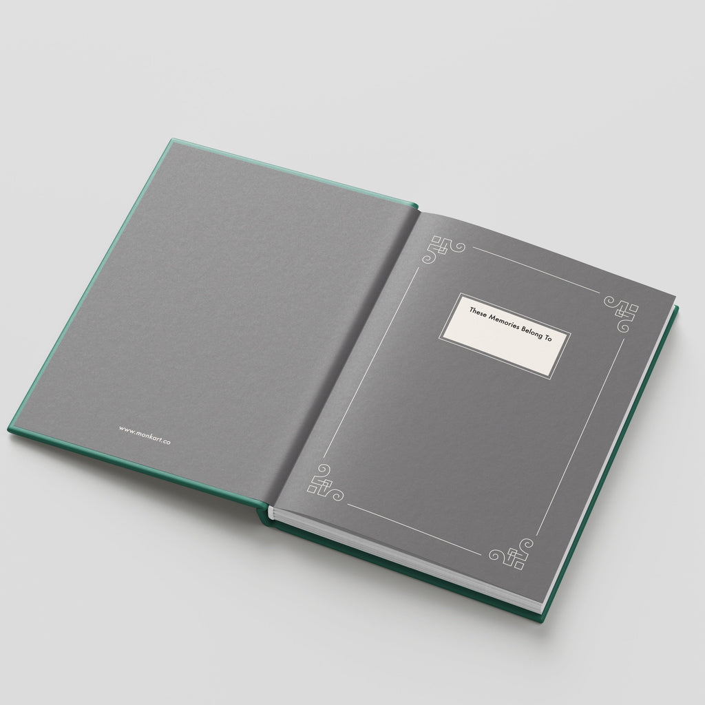 Gray book with decorative design on a light gray background