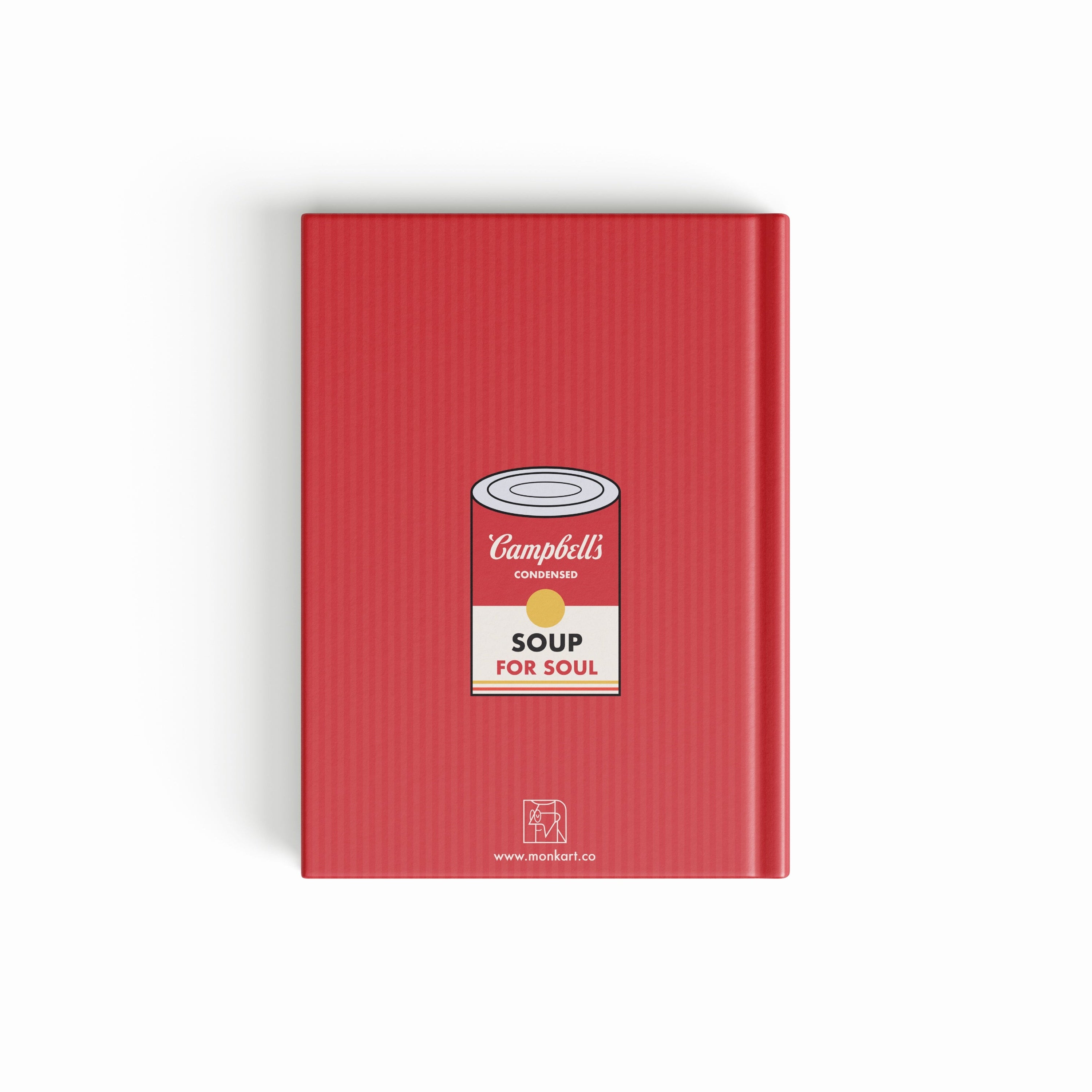Red notebook with a soup can design on the cover against a white background