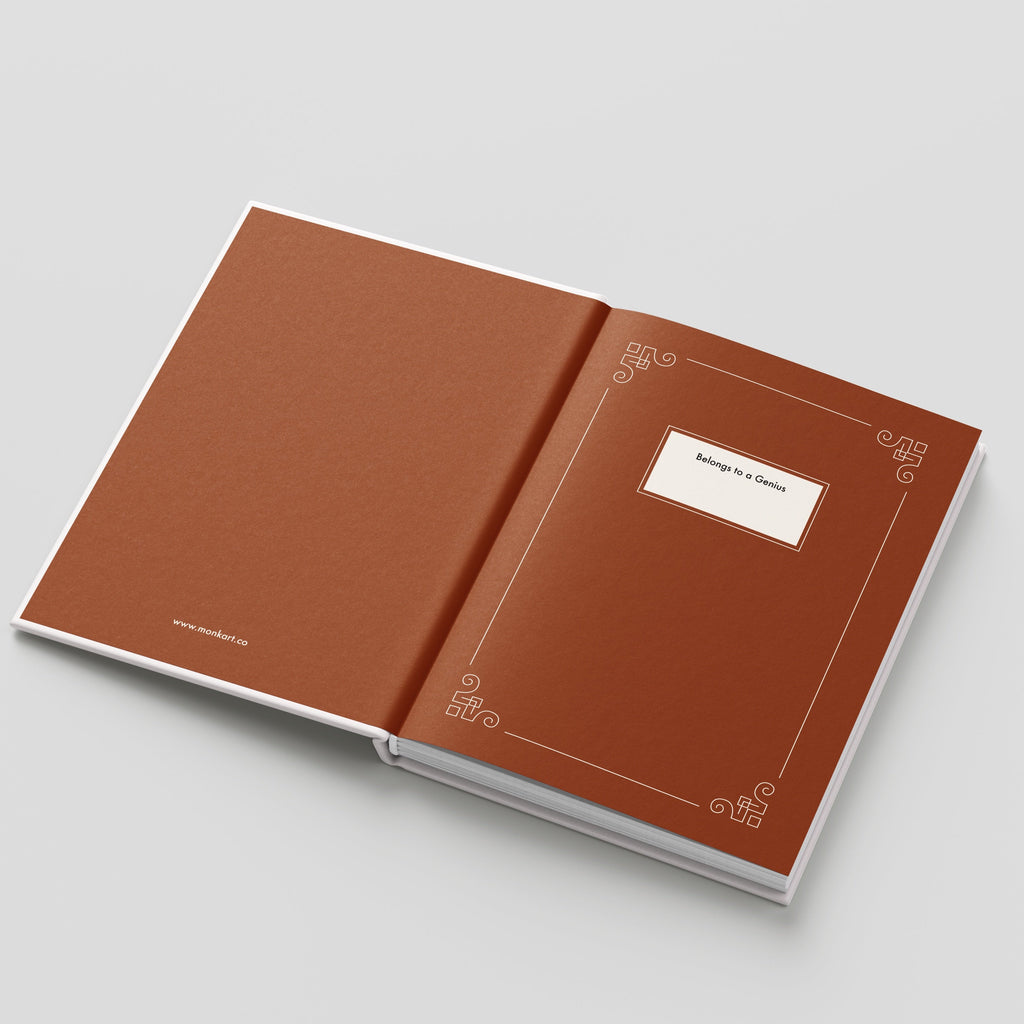 Open brown book with decorative elements on a light gray background