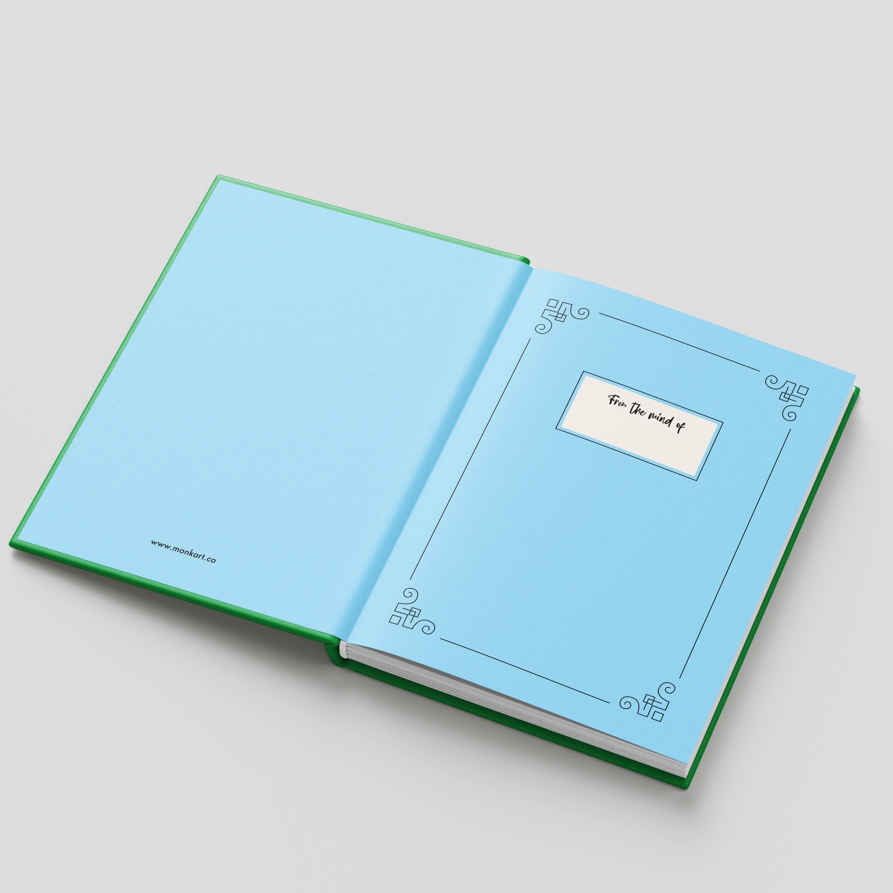 Open notebook with light blue pages on a gray background