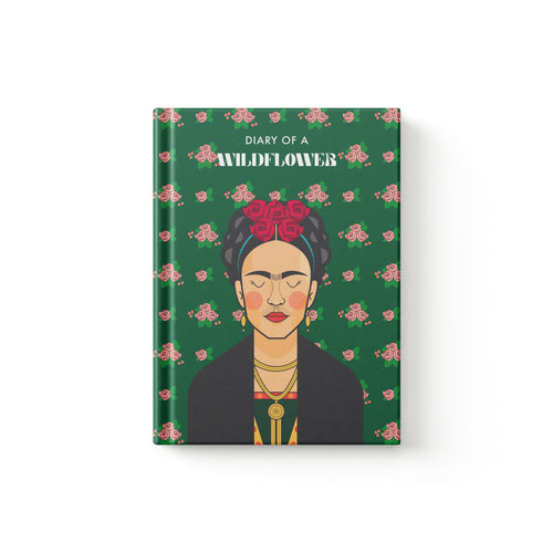 A hardcover journal titled 'DIARY OF A WILDFLOWER' featuring a stylized illustration of Frida Kahlo on a dark green floral background, shown on a clean white background.