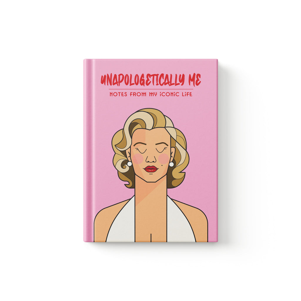 A hardcover notebook with a pink cover featuring a Monkart stylized illustration of Marilyn Monroe and the text 'UNAPOLOGETICALLY ME' and 'NOTES FROM MY ICONIC LIFE', shown on a clean white background.