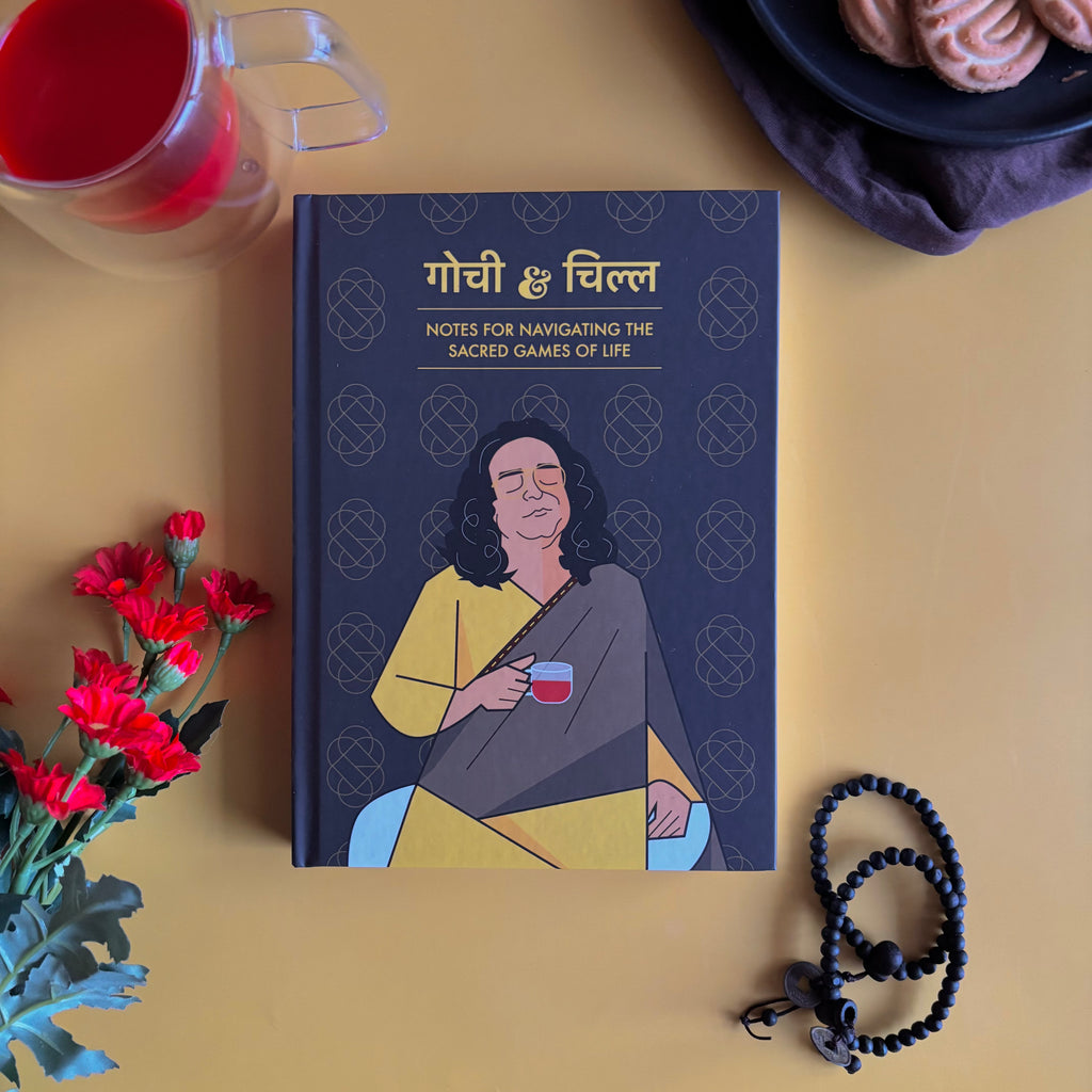 Notebook titled 'Gochi & Chill' inspired by Netflix TV Show Sacred Games with a person holding a cup on a yellow surface with flowers and a teacup.  Designed by Monkart.