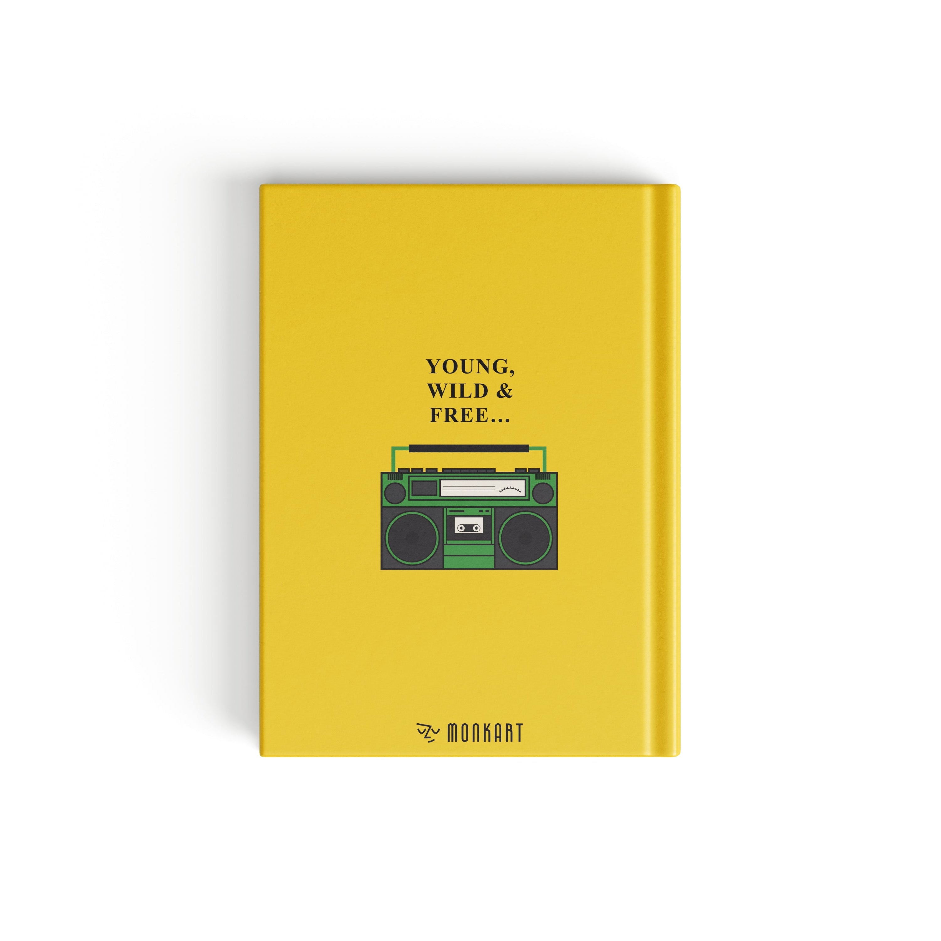A yellow hardcover notebook with a retro cassette tape graphic on the front cover, featuring the text 'YOUNG. WILD & FREE'.